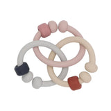 Anneau de dentition bébé silicone : Eden de couleur rose, beige et gris