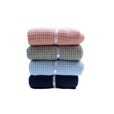 Couverture bébé tricot gaufré : Jessy empilé de plusieurs couleurs 
