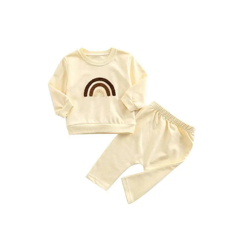 Ensemble bébé survêtement : Ugo couleur beige avec un motif arc-en-ciel sur le pull